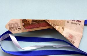 Риба манигами - занаят, изработен от банкнота