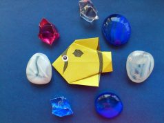 Bright yellow origami fish