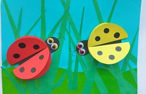 Paper applique "Ladybugs in the grass"