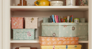 📦 How to make durable storage boxes from cardboard: tricks of the trade Multicolored reinforced cardboard storage boxes stacked neatly in a pantry stack